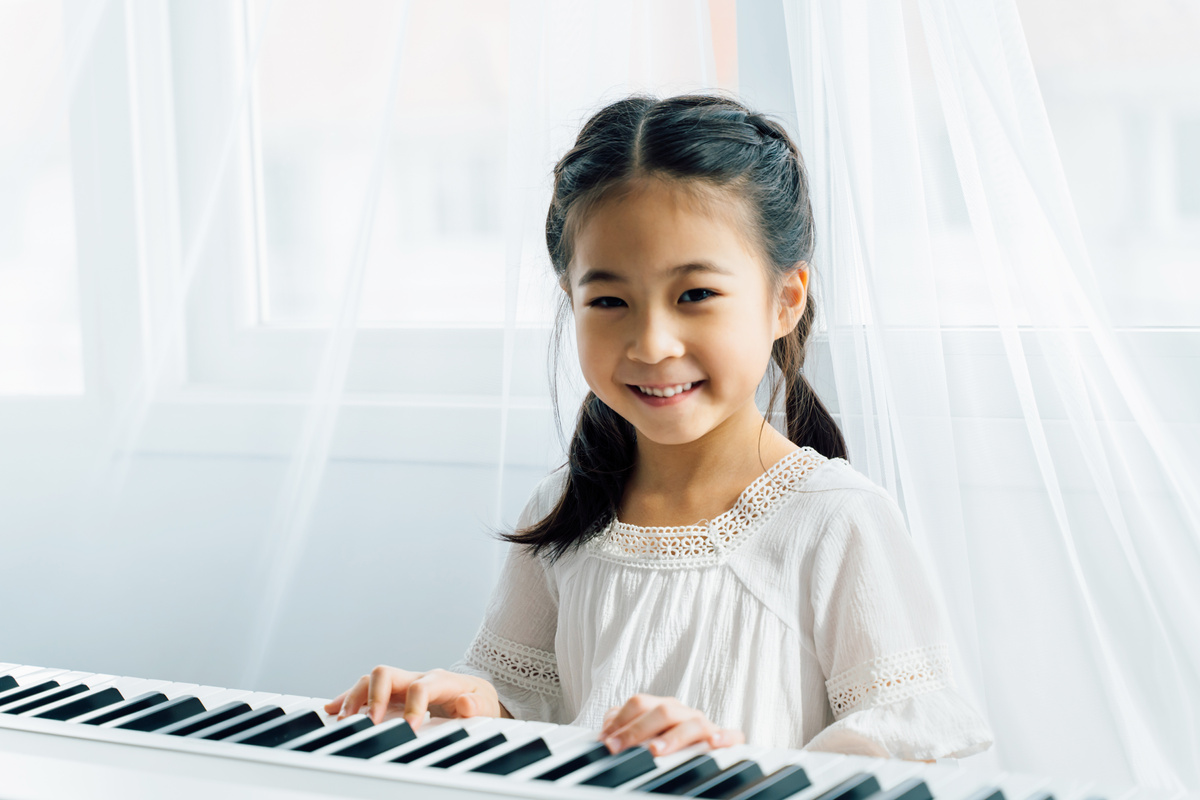 Little Girl Playing the Piano